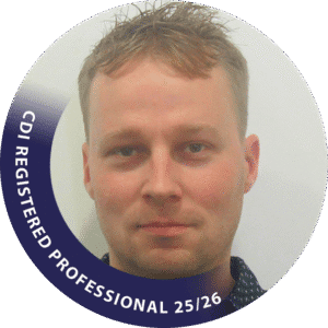 Professional Headshot Of A Careers And Employment Consultant With Short Light-Brown Hair, Shown Inside A Circular Badge Displaying The Text ‘Cdi Registered Professional 25/26’. Used On The Homepage To Introduce The Site’s Expert Guidance On Careers, Employment, Learning, And Ai.